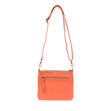 Your perfect goes with anything bag! In just the right size to carry your essentials, this beautiful grapefruit colored pebbled vegan leather bag has multiple pockets and a top zip closure for security, so you are ready for anything your day brings. Add one of our interchangeable Guitar Straps to add your own style!


Product Details
Dimensions: 11 in. W x 11.25 in. H x 3.5 in. D
Magnetic Snap Closure
2 Open and 1 Zipper Interior Pockets
2 Exterior Open Pockets and 1 Back Zipper Pocket
12x18 in. Drop Adjust