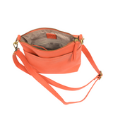 Your perfect goes with anything bag! In just the right size to carry your essentials, this beautiful grapefruit colored pebbled vegan leather bag has multiple pockets and a top zip closure for security, so you are ready for anything your day brings. Add one of our interchangeable Guitar Straps to add your own style!


Product Details
Dimensions: 11 in. W x 11.25 in. H x 3.5 in. D
Magnetic Snap Closure
2 Open and 1 Zipper Interior Pockets
2 Exterior Open Pockets and 1 Back Zipper Pocket
12x18 in. Drop Adjust