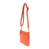 Your perfect goes with anything bag! In just the right size to carry your essentials, this beautiful grapefruit colored pebbled vegan leather bag has multiple pockets and a top zip closure for security, so you are ready for anything your day brings. Add one of our interchangeable Guitar Straps to add your own style!


Product Details
Dimensions: 11 in. W x 11.25 in. H x 3.5 in. D
Magnetic Snap Closure
2 Open and 1 Zipper Interior Pockets
2 Exterior Open Pockets and 1 Back Zipper Pocket
12x18 in. Drop Adjust