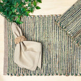 Need to add a little texture to your home? You'll love this stylish, sustainable, durable hand-woven khaki and green-colored placemat. It&nbsp;will surely enrich the décor of any surface in your home. Made with Jute and cotton, this placemat is environmentally friendly, sustainable, trendy, and stylish.  13" W x 19"L  Spot clean only.  Jute &amp; Cotton  Handmade in India