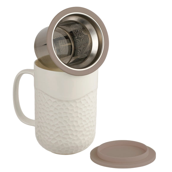 This 15oz Coral design tea infuser mug is made from new bone china and has a grey silicone top. The exterior of the tea infuser mug features a coral-textured design. The top part of the mug where you drink is a smooth finish. The mug's interior is white, allowing you to see the color of the tea. The mug includes a stainless steel filter for loose-leaf tea and tea bags. The mug has a comfortable handle and a nice weight and feel. It is not too heavy. The handle does not get hot in the microwave.
