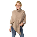 The epitome of cozy, this everyday luxury poncho is crafted from a soft knit fabric in beige heather, with a rich cable texture that adds depth and dimension. Designed with a relaxed drape and a comfortable turtleneck, it delivers effortless warmth while maintaining an elevated, easy silhouette. The lightweight feel allows for comfortable layering without bulk, making it a versatile piece for both casual and polished styling. Soft. Luxe. and made for all day comfort, this poncho brings refined ease and time