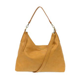 This oversized, slouchy, cool hobo bag is made of tumbled buffalo grain honeycomb colored vegan leather, which gives it that casual boho chic look! With two removable shoulder straps included, you can wear it as a short-shoulder bag or a crossbody bag.  Dimensions: 13.5 in. H x 16 in. W x 3.5 in. D