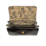 Put a ring on it! Perfect for your next night out, this cute black bracelet bag looks great with your fav jeans or slinky dress! With multiple compartments, it is just the right size to hold all your essentials. Wear it on your wrist with the metallic ring bracelet, or carry as a clutch, or wear as a crossbody with the detachable shoulder strap.


Dimensions: 6 in. H x 8.25 in. W x 3.5 in. at deepest point
Tapers up to the top point
Adjustable and removable crossbody strap: 20-25 in.
3 in. diameter ring tha