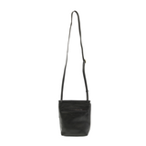 With a slim, streamlined look, this vegan leather crossbody in a beautiful cinnamon black features a top flap with magnetic snap closure and an adjustable shoulder strap so you can carry it as a crossbody or a shoulder bag. With two convenient slip pockets, one under the flap and one on the back you can keep your phone and keys in easy reach.


Dimensions: 9.5 in. H x 8 in. W x 2.75 in. D
Magnetic snap closure
Adjustable shoulder strap: 14 in. - 27.5 in. drop
Brass plated hardware
100% Vegan leather (polyur