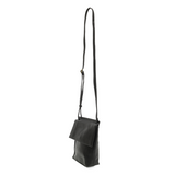 With a slim, streamlined look, this vegan leather crossbody in a beautiful cinnamon black features a top flap with magnetic snap closure and an adjustable shoulder strap so you can carry it as a crossbody or a shoulder bag. With two convenient slip pockets, one under the flap and one on the back you can keep your phone and keys in easy reach.


Dimensions: 9.5 in. H x 8 in. W x 2.75 in. D
Magnetic snap closure
Adjustable shoulder strap: 14 in. - 27.5 in. drop
Brass plated hardware
100% Vegan leather (polyur