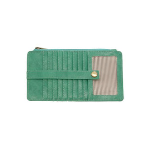 This slim and sleek wallet has nine credit card pockets, each with a snap tab for security and brass-plated hardware. It also has an ID window, zippered change pocket, and zippered billfold pocket in distressed jungle green vegan leather.


DIMENSIONS: 3.75 IN. H X 7.25 IN. W X .25 IN. D&nbsp;


100% Vegan leather (polyurethane)
