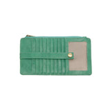This slim and sleek wallet has nine credit card pockets, each with a snap tab for security and brass-plated hardware. It also has an ID window, zippered change pocket, and zippered billfold pocket in distressed jungle green vegan leather.


DIMENSIONS: 3.75 IN. H X 7.25 IN. W X .25 IN. D&nbsp;


100% Vegan leather (polyurethane)