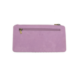 This slim and sleek wallet has nine credit card pockets, each with a snap tab for security and brass-plated hardware. It also has an ID window, zippered change pocket, and zippered billfold pocket in distressed lilac vegan leather.


DIMENSIONS: 3.75 IN. H X 7.25 IN. W X .25 IN. D&nbsp;


100% Vegan leather (polyurethane)