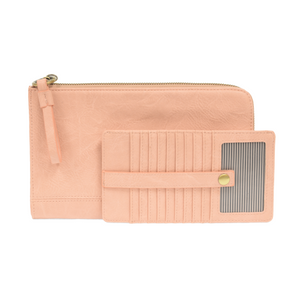 The Karina combines sleek styling with uber organization in beautiful antique-looking petal pink vegan leather! This bag has the ultimate versatility, as it can be worn as a crossbody, a clutch, or a wristlet. The bonus wallet, which includes credit card slots, ID windows, a zippered change pocket, and a billfold, will keep you organized and can be carried separately!


MAIN BAG: 9"H x 6"W x 1"D



Removable and adjustable crossbody strap 21"-26" with lobster claw clasps

Removable long wristlet strap 7" lo