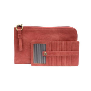 The Karina combines sleek styling with uber organization in beautiful antique-looking desert coral vegan leather! This bag has the ultimate versatility, as it can be worn as a crossbody, a clutch, or a wristlet. The bonus wallet, which includes credit card slots, ID windows, a zippered change pocket, and a billfold, will keep you organized and can be carried separately!


MAIN BAG: 9"H x 6"W x 1"D



Removable and adjustable crossbody strap 21"-26" with lobster claw clasps

Removable long wristlet strap 7" 