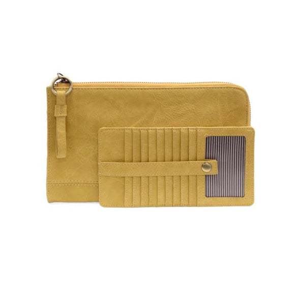 The Karina combines sleek styling with uber organization in beautiful antique-looking Laguna yellow vegan leather! This bag has the ultimate versatility, as it can be worn as a crossbody, a clutch, or a wristlet. The bonus wallet, which includes credit card slots, ID windows, a zippered change pocket, and a billfold, will keep you organized and can be carried separately!


MAIN BAG: 9