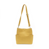 Casual and carefree crossbody in super soft pebble grain vegan leather! Our Kayleigh bucket bag in a beautiful butter yellow&nbsp;comes with a smaller bag that can be carried inside or used alone! The convenient side pockets of this bucket bag can carry your water bottle, phone or glasses.&nbsp;


11" W X 11.25" H X 3.5"
Magnetic Snap Closure
2 open and 1 zipper interior pockets
2 exterior open pockets and 1 back zipper pocket
12- 18" adjustable drop and detachable crossbody strap with lobster claw clasps
B
