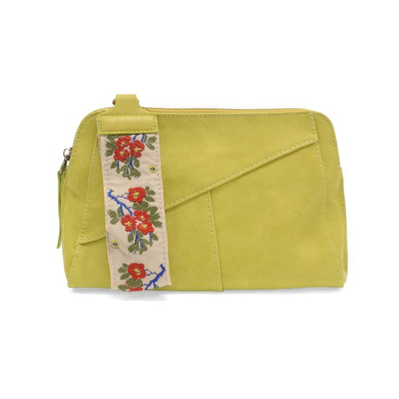 Retro styling crafted in antiqued vegan leather gives this key lime clutch a vintage vibe. The removable woven wrist strap is the finishing touch on this stylish bag, so you can wear as a wristlet, a clutch, or even a crossbody with the included removable shoulder strap!





6.75