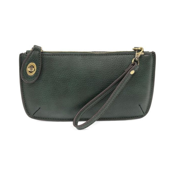 Our most popular bag, in a rich green opal color, this mini clutch, with its sleek silhouette, is as gorgeous as it is versatile.  Features include a polished turn lock, six card slots, and an interior zipper for change.  It can be styled in many ways, with removable straps for alternating between wallet, crossbody, and wristlet!   5