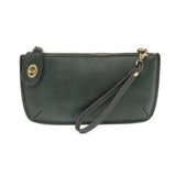 Our most popular bag, in a rich green opal color, this mini clutch, with its sleek silhouette, is as gorgeous as it is versatile.  Features include a polished turn lock, six card slots, and an interior zipper for change.  It can be styled in many ways, with removable straps for alternating between wallet, crossbody, and wristlet!   5"H x 9.5"W x 1"D