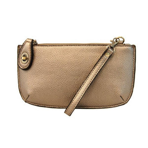 Our most popular bag, in a beautiful metallic light bronze, this mini clutch, with its sleek silhouette, is as gorgeous as it is versatile.  Features include a polished turn lock, six card slots, and an interior zipper for change.  It can be styled in many ways, with removable straps for alternating between wallet, crossbody, and wristlet!   5"H x 9.5"W x 1"D