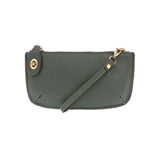 Our most popular bag in a rich chive color! With its sleek silhouette, this mini clutch is as gorgeous as it is versatile.  Features include a polished turn lock, six card slots, and an interior zipper for change.  It can be styled in many ways, with removable straps for alternating between wallet, crossbody, and wristlet!   5"H x 9.5"W x 1"D