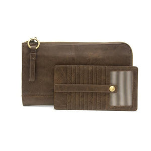 The Karina combines sleek styling with uber organization in beautiful antique-looking dark walnut vegan leather! The ultimate in versatilty, this bag can be worn as a crossbody, carried as a clutch or as a wristlet.  The included bonus wallet with credit card slots, id windows, zippered change pocket, and billfold will keep you organized on the go and can be carried separately!
