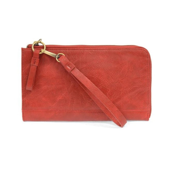 The Karina combines sleek styling with uber organization in beautiful antique-looking red vegan leather! The ultimate versatility, this bag can be worn as a crossbody, as a clutch, or as a wristlet.  The included bonus wallet with credit card slots, ID windows, zippered change pocket, and billfold will keep you organized on the go and can be carried separately!