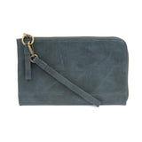 The Karina combines sleek styling with uber organization in beautiful antique-looking Deja Blue vegan leather! The ultimate versatility, this bag can be worn as a crossbody, as a clutch, or as a wristlet.  The included bonus wallet with credit card slots, ID windows, zippered change pocket, and billfold will keep you organized on the go and can be carried separately!