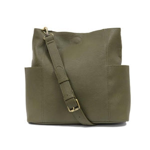 Casual and carefree crossbody in super soft pebble grain vegan leather! Our Kayleigh bucket bag in Olive comes with a smaller bag that can be carried inside or used alone! The convenient side pockets of this bucket bag can carry your water bottle, phone or glasses.  11" W X 11.25" H X 3.5" Magnetic Snap Closure 2 open and 1 zipper interior pockets 2 exterior open pockets and 1 back zipper pocket 12- 18" adjustable drop and detachable crossbody strap 