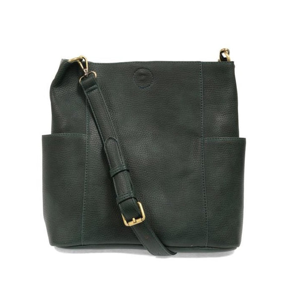 Casual and carefree crossbody in super soft pebble grain vegan leather! Our Kayleigh bucket bag in a beautiful green-opal color comes with a smaller bag that can be carried inside or used alone! The convenient side pockets of this bucket bag can carry your water bottle, phone, or glasses.  11
