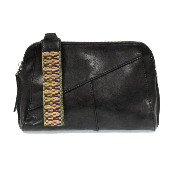 Retro styling crafted in antiqued vegan leather gives this black-colored clutch a vintage vibe. The removable woven wrist strap is the finishing touch on this stylish bag so you can wear it as a wristlet, clutch, or crossbody with the included removable shoulder strap!   6.75