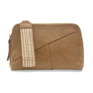 Retro styling crafted in antiqued vegan leather gives this light tan clutch a vintage vibe. The removable woven wrist strap is the finishing touch on this stylish bag so that you can wear it as a wristlet, clutch, or crossbody with the included removable shoulder strap!