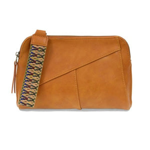 Retro styling crafted in antiqued vegan leather gives this Honey colored clutch a vintage vibe. The removable woven wrist strap is the finishing touch on this stylish bag, so you can wear as a wristlet, a clutch, or even a crossbody with the included removable shoulder strap!   6.75"H x 9.75"W x 2.25"D