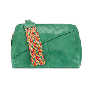 Retro styling crafted in antiqued vegan leather gives this fun jungle green-colored clutch a vintage vibe. The removable woven wrist strap is the finishing touch on this stylish bag so you can wear it as a wristlet, a clutch, or a crossbody with the included removable shoulder strap!      6.75"H x 9.75"W x 2.25"D