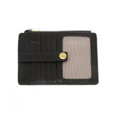 We love this mini wallet in a black vegan leather! It is full of style and will hold your license and up to six credit cards. The zipper pocket is roomy enough for your change and cash, and a pocket is on the back.  This mini wallet is perfect for you, but it makes an awesome gift!  DIMENSIONS: 4 IN. H X 5.5 IN. W X .25 IN. D
