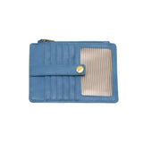 We love this mini wallet in a beautiful surf blue vegan leather! It is full of style and will hold your license and up to six credit cards. The zipper pocket is roomy enough for your change and cash, and a pocket is on the back.  This mini wallet is perfect for you, but it makes an awesome gift!  DIMENSIONS: 4 IN. H X 5.5 IN. W X .25 IN. D  ZIPPERED TOP CLOSURE ON EDGE  6 CREDIT CARD POCKETS  ID WINDOW POCKET
