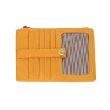 We love this mini wallet in a butterscotch vegan leather! It is full of style and will hold your license and up to six credit cards. The zipper pocket is roomy enough for your change and cash, and a pocket is on the back.  This mini wallet is perfect for you, but it makes an awesome gift!  DIMENSIONS: 4 IN. H X 5.5 IN. W X .25 IN. D