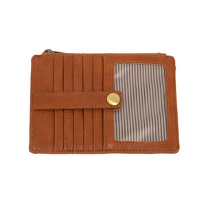 We love this mini wallet in a pretty chicory brown vegan leather! It is full of style and will hold your license and up to six credit cards. The zipper pocket is roomy enough for your change and cash, and a pocket is on the back.  This mini wallet is perfect for you, but it makes an awesome gift!  DIMENSIONS: 4 IN. H X 5.5 IN. W X .25 IN. D