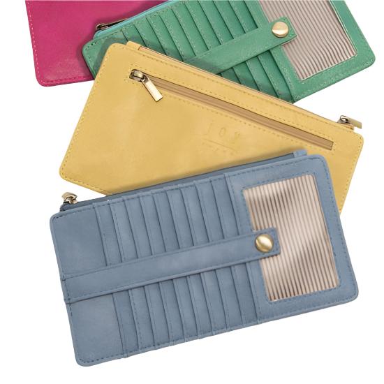 This slim and sleek wallet has nine credit card pockets, each with a snap tab for security and brass-plated hardware. It also has an ID window, zippered change pocket, and zippered billfold pocket in distressed bluebird skies vegan leather.


DIMENSIONS: 3.75 IN. H X 7.25 IN. W X .25 IN. D 


100% Vegan leather (polyurethane)