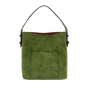 Equally timeless and modern, our best-selling classic hobo is made in rich vegan leather in a beautiful dark emerald faux suede, accented with a brown strap.&nbsp; This roomy bag, accented with a large front pocket and a snap-in removable brown crossbody, has plenty of room to carry your needs in style.