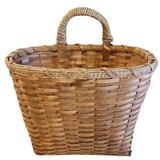 This large chipwood basket will look great hanging on a wall, a door, and even a door knob! Stick in some ivy or flowers that you can change out each season for versatile decorating!

17.5" H x 15.5" W x 9.5" D
