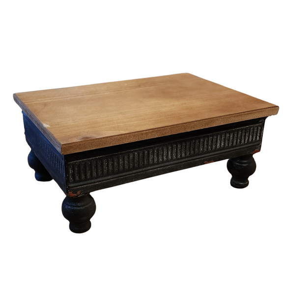 Use this large footed riser in your displays!  The top is a warm natural wood with a distressed black metal ribbed band and then wooden black feet. 

5.5