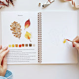 The Autumn Watercolor Workbook includes 12 fall-themed illustrations with an example of the finished painting, step-by-step instructions, and a lightly illustrated sketch for you to paint. It's just like a coloring book, but with watercolor! &nbsp;Enjoy this peaceful painting hobby on your own, with children, or with friends. Makes a wonderful gift and is perfect for artists of any age.

12 beginner-friendly illustrations on thick 120lb watercolor paper

Lay-flat pages with spiral binding for hassle-free pa