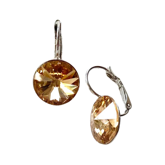 What a stunning earring! You'll get so many compliments when you wear these genuine light Colorado Topaz Swarovski crystal earrings!

14 mm crystals, silver post.