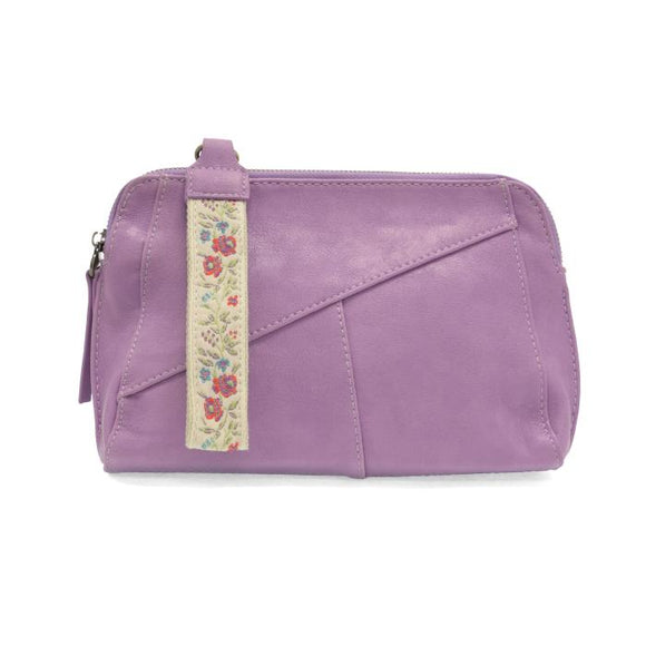 Retro styling crafted in antiqued vegan leather gives this lilac clutch a vintage vibe. The removable woven wrist strap is the finishing touch on this stylish bag, so you can wear as a wristlet, a clutch, or even a crossbody with the included removable shoulder strap!





6.75