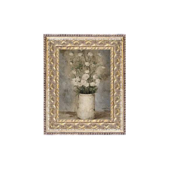 This almost whimsical print has a vase that is full of white roses. Printed on premium canvas fabric for a lasting, textured finish and has a handcrafted ornate gold frame that adds a classic charm.  Comes with a paper backing and hanging hardware for easy installation.

Made in the USA: Proudly crafted with quality and care. 

Care Instructions: Keep canvas dry to maintain its quality. If smudged or dirty, gently wipe with a dry, soft cloth.