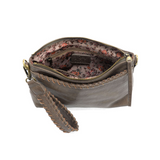 This sleek top zip clutch crafted in a taupe colored buffalo grain vegan leather is accented with whipstitching to give it a modern western style. It looks great with jeans or a dress and easily goes from day to night as the Oakley can be carried as a clutch, a wristlet or a crossbody bag with the included detachable wristlet strap with whipstitched details, an adjustable and removable shoulder strap.


Dimensions: 7 in. H x 10 in. W x 3 in. D
Top zip closure
Wristlet strap with whipstitching: 8 in. long
Ad