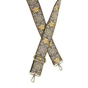 Let your star shine bright! Personalize your bag with this embroidered guitar strap in a beautiful celestial pattern in a lovely black, cream, and gold!     2" wide  35-54" adjustable length  Brass plated hardware  100% Cotton