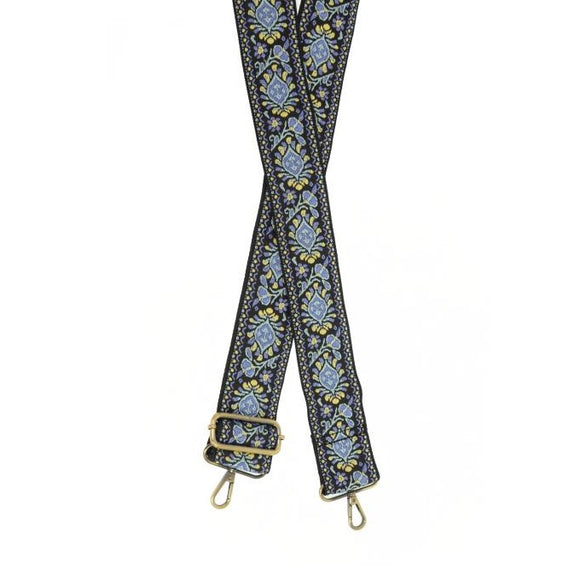 Let your boho side show!  Give your bag a POP with this guitar strap! Colors of yellow, turquoise blue, and periwinkle blue are on a black background.  The back of the strap is solid black.  2