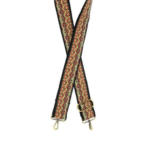 Express your style & personalized your bag with this cool guitar strap in a vibrant zig-zag geometric print. In sunset shades of coral and yellow on a black background, you'll put some pep in your step carrying your favorite bag with this new strap!  The back of the strap is black.  2" wide Adjustable strap is 35"-54" Embroidered woven cotton Antique brass hardware
