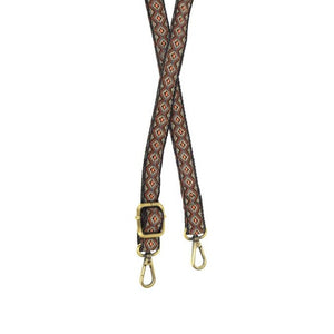 This beautiful 1" guitar strap is in rich colors of brown, creams, blues, and oranges in a zig-zag diamond pattern. The back of the strap is dark brown.  1" wide  35"-54" adjustable length  80% Polyester 20% Cotton  Brass Plated Hardware