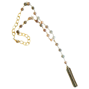 What a fun statement piece! This beautiful multi-moonstone beaded necklace has a gold bar at the bottom with a cross on it. The necklace has a lobster clasp and is approximately 18” in length with a 4” drop.&nbsp;