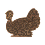 This adorable carved wood turkey figurine brings warm harvest charm to your autumn and Thanksgiving home decor. This 13.5-inch freestanding piece features an intricate botanical cutout design and a rich, dark-stained finish, making it a perfect statement piece for mantels, shelves, and tabletops. Crafted from premium mango wood with layered carved detailing, this artisan-style turkey offers a dimensional silhouette and organic, vine-inspired texture. The collected, heirloom-quality look blends beautifully w